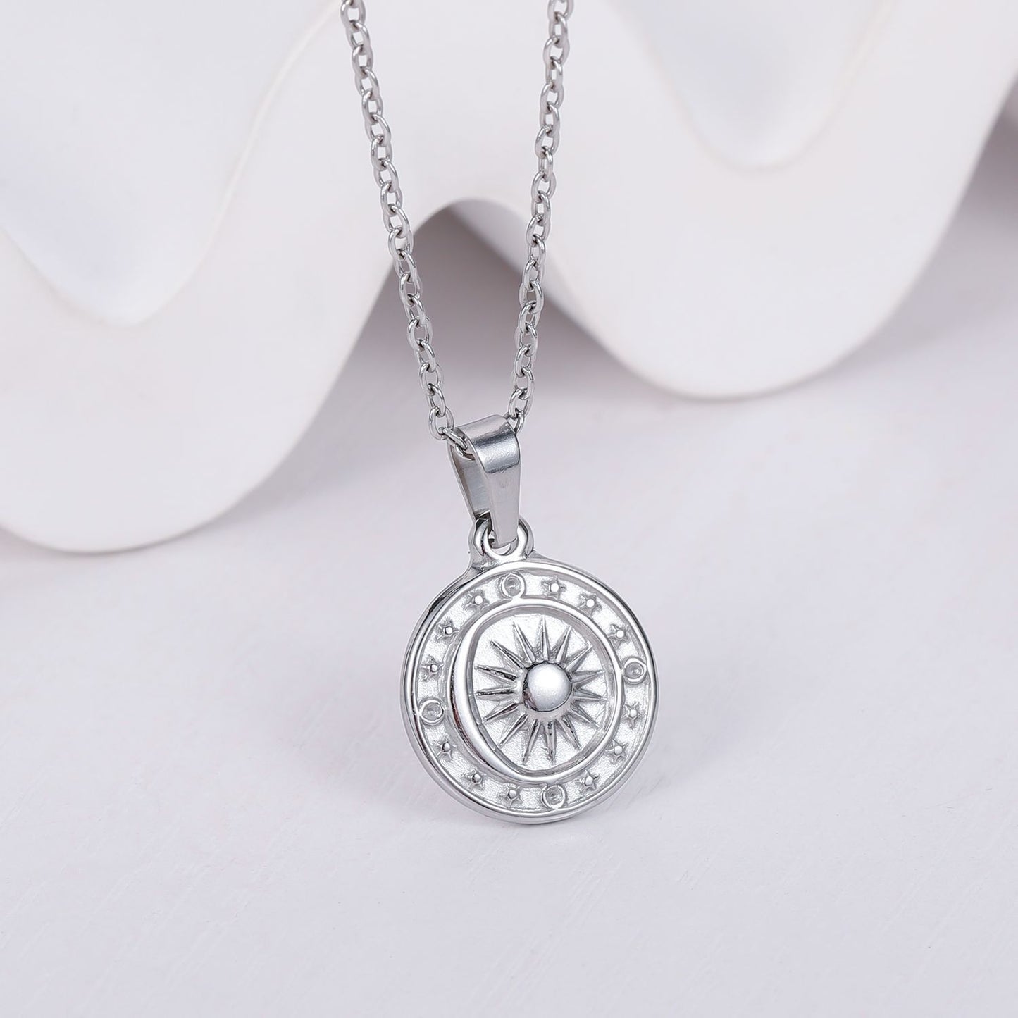 Collier pendentif boussole XINGX soleil lune en acier titane