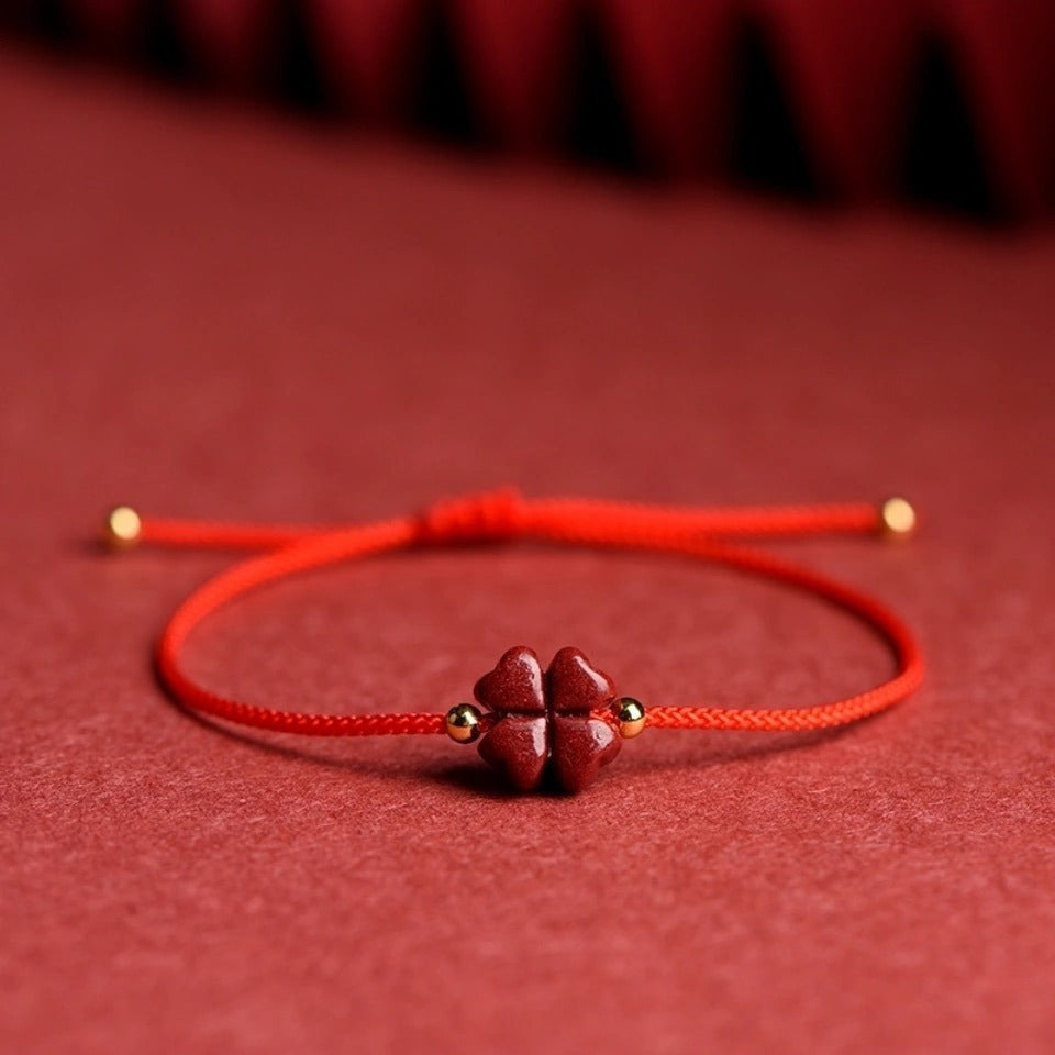 Bracelet corde rouge trèfle cinabre