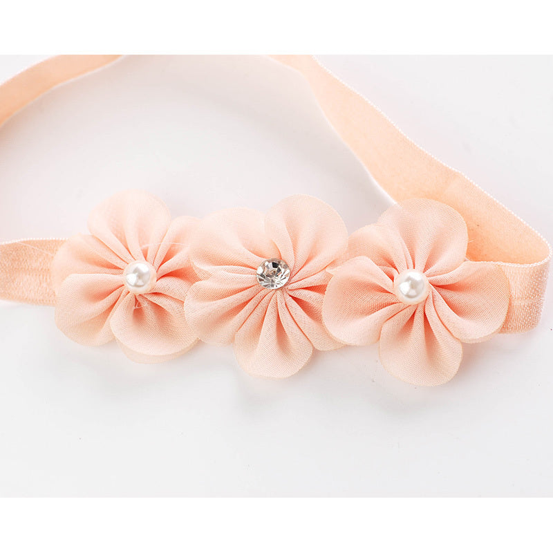 Bandeau bébé trois petites fleurs de prunier