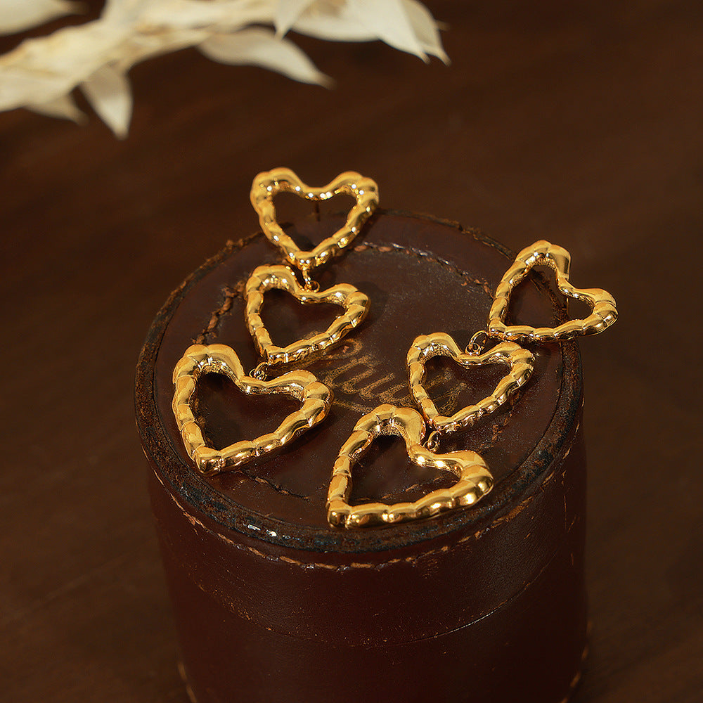 Boucles d'oreilles cœur de pêche de haute qualité, en acier titane plaqué or, Design irrégulier rétro minoritaire