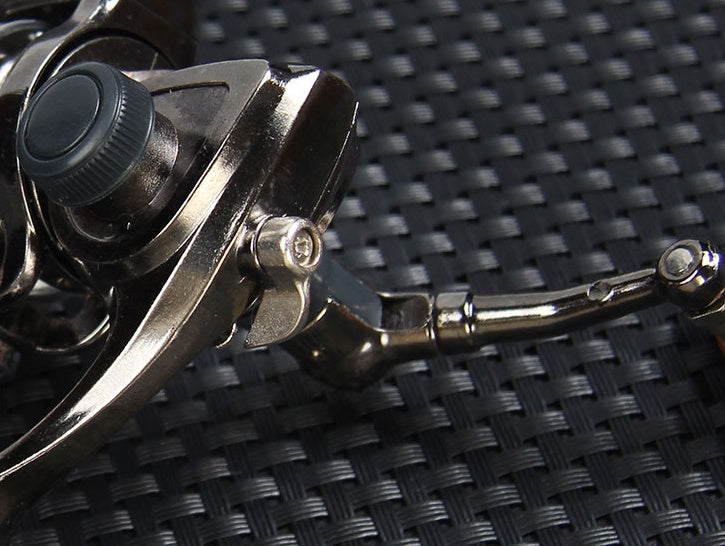 Carrete de pesca mini 100 totalmente metálico.