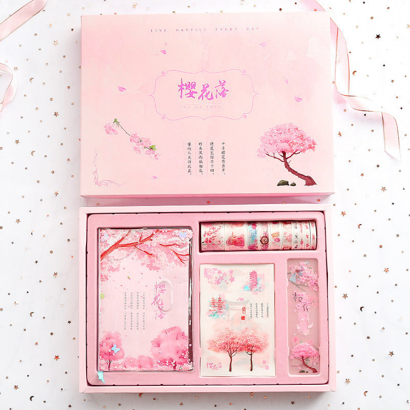 Lindo y creativo juego de caja de regalo con libro mayor de mano en flor de cerezo