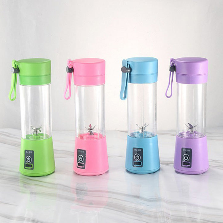 Versión exprimidor de frutas eléctrico Mini portátil pequeño vaso de jugo de torbellino