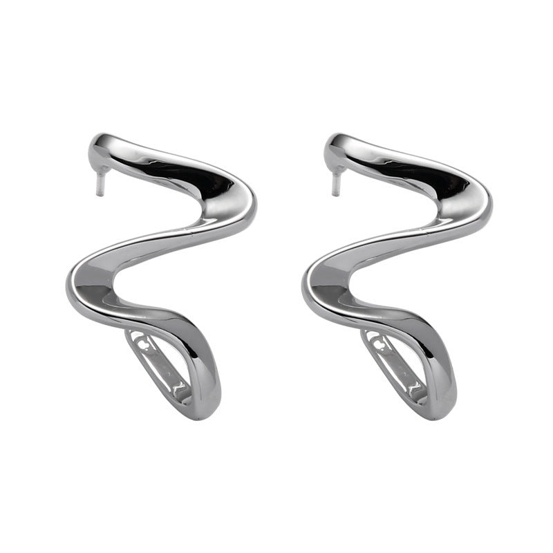 Niche de boucles d’oreilles abstraites posées en spirale