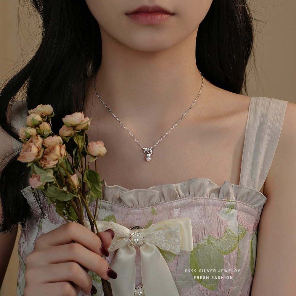 S999 Sterling Silver Bow Lily Necklace