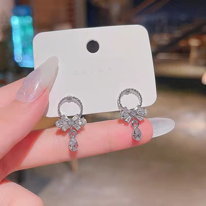 Boucles d'oreilles féminines polyvalentes et atmosphériques