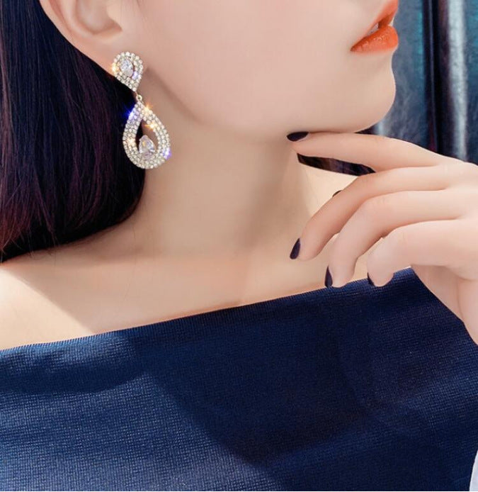 Boucles d'oreilles pendantes incrustées de diamants brillants pour femmes