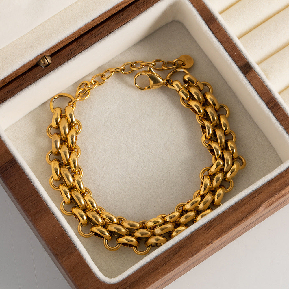 Bracelet pour femme à chaîne géométrique en acier titane et or 18 carats