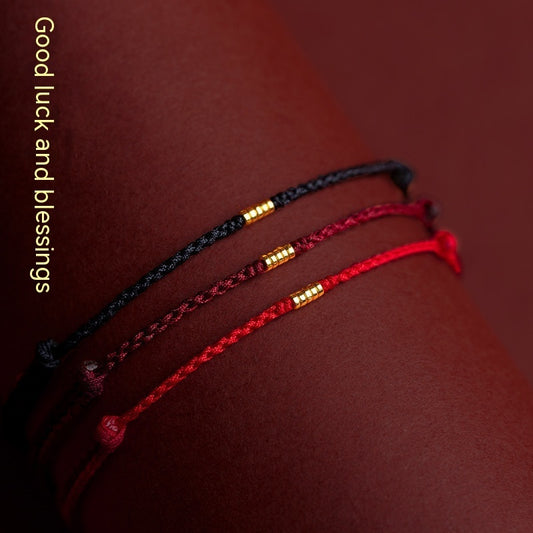 Bracelet en corde rouge tressé à la main avec petites perles