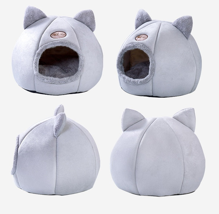 Nido semicerrado para mascotas, cálido y esponjoso.