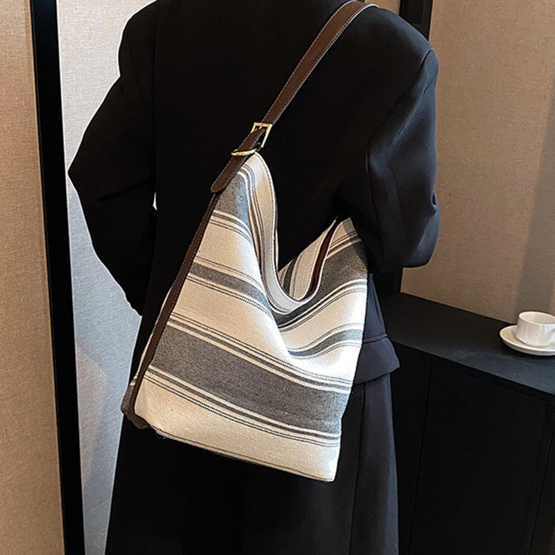 Sac seau porté main à rayures artistiques pour femme