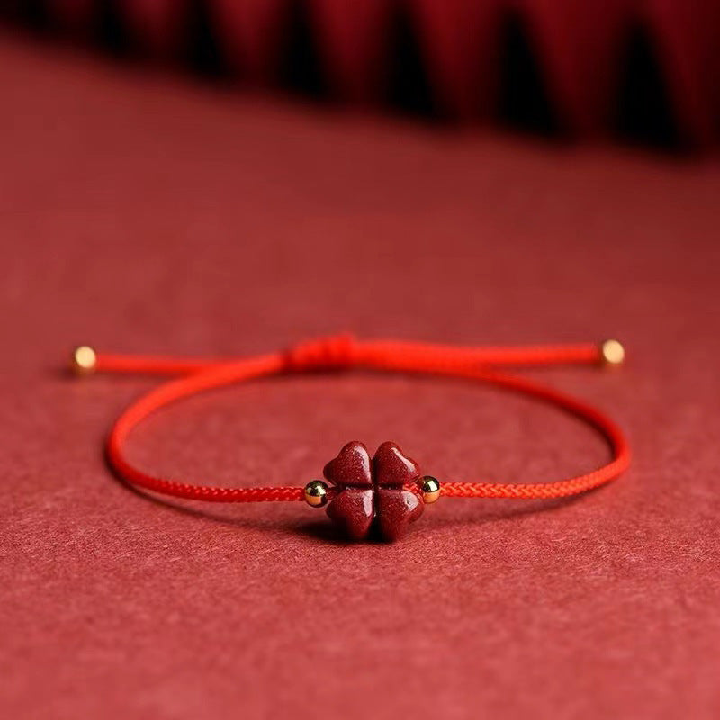Bracelet corde rouge trèfle cinabre