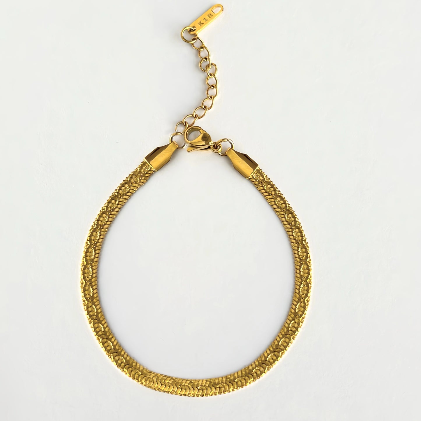 Traje de pulsera de oro y plata con estampado en relieve