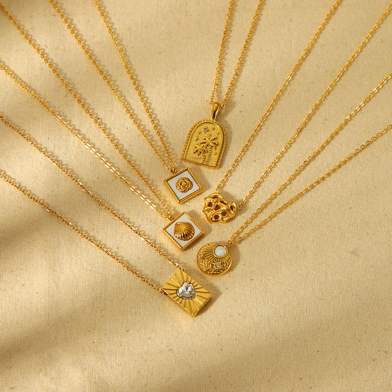 Collier pendentif géométrique en forme de cœur et de palmier en acier inoxydable en or 18 carats
