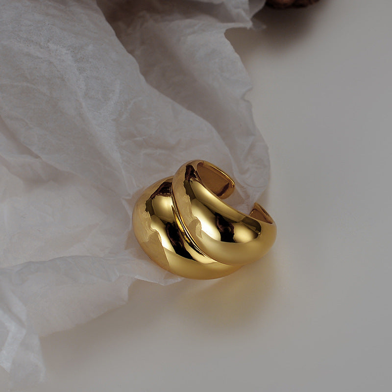 La bague féminine brillante géométrique ne se décolore pas