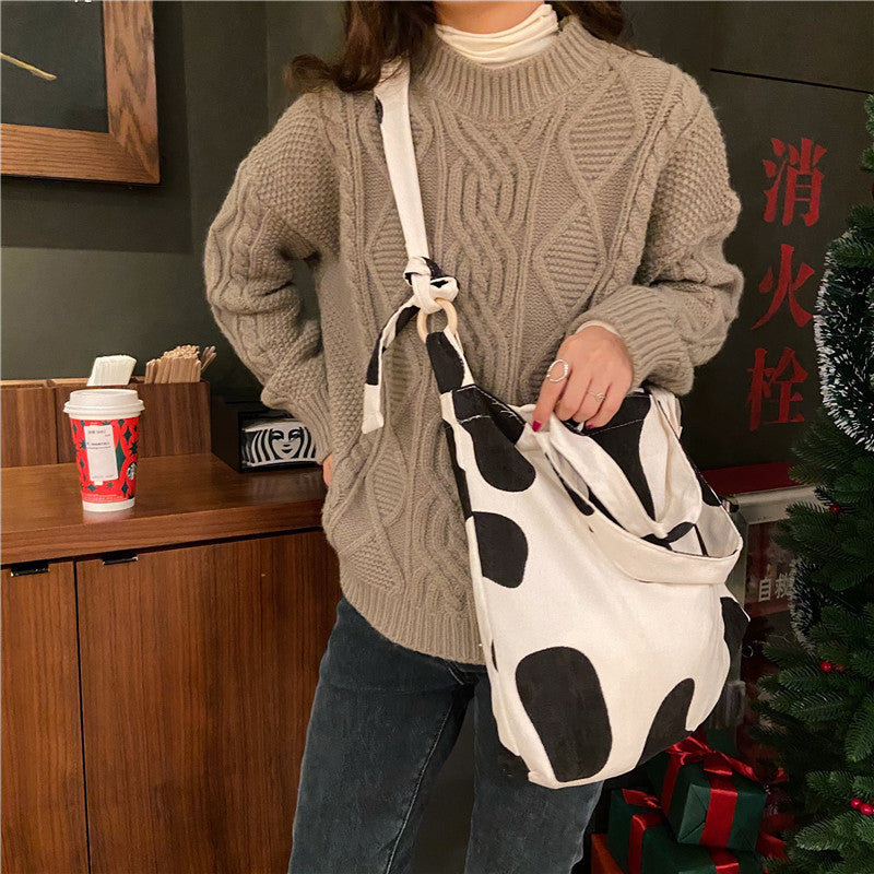 Sac messager rose rétro artistique simple de grande capacité