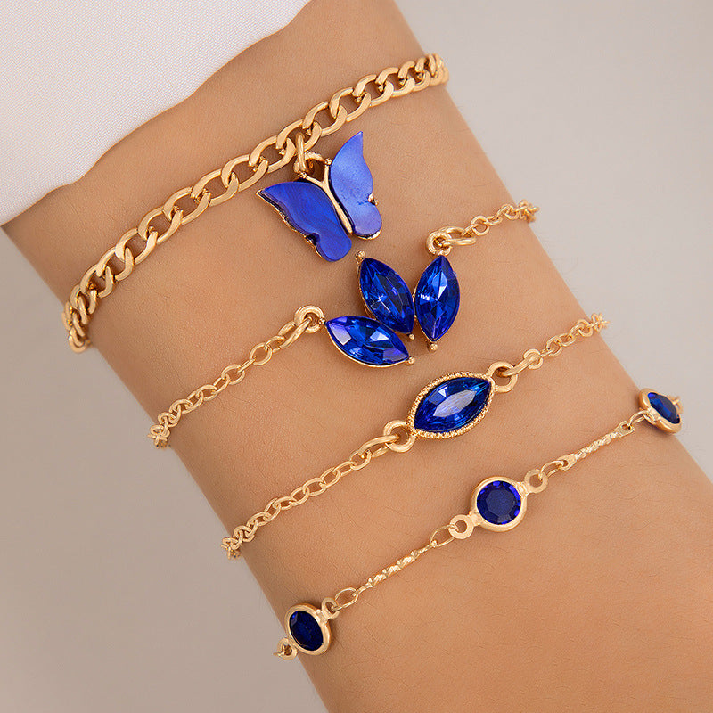 Bracelet à quatre couches creux clouté de diamants papillon bleu