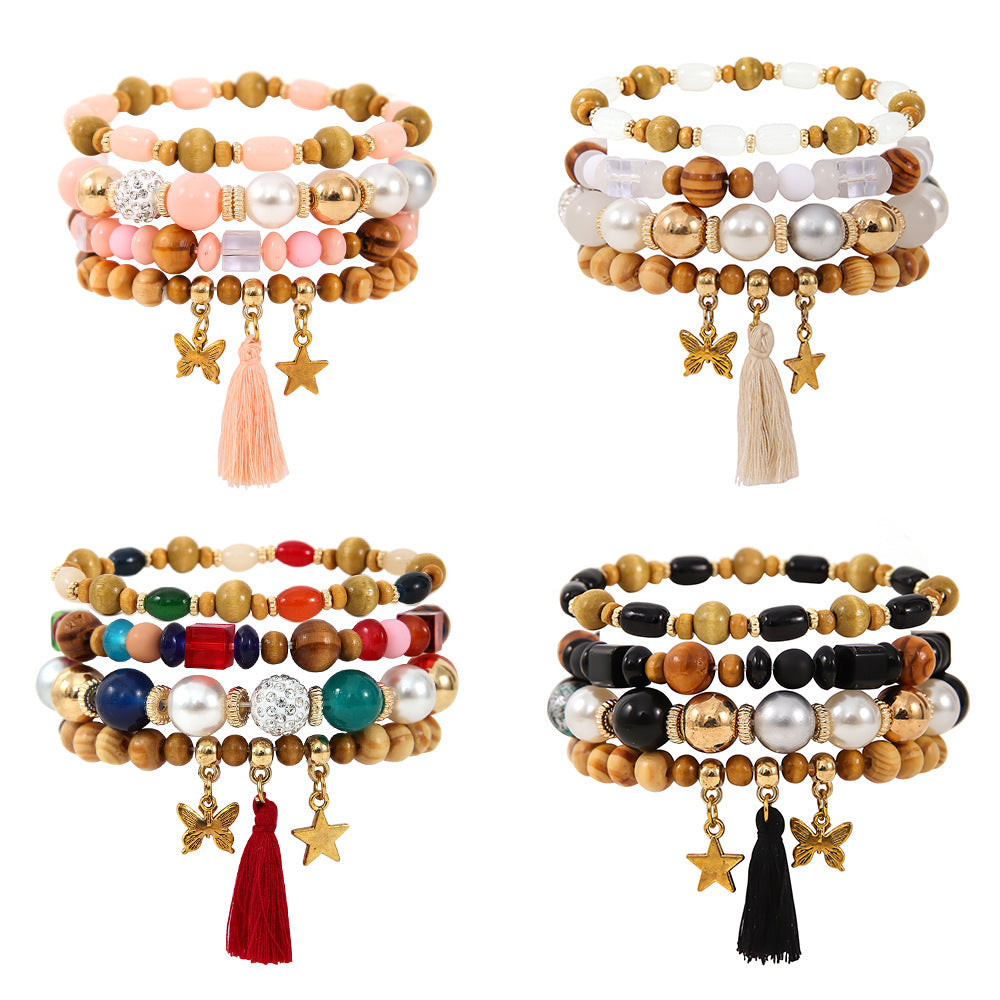 Costume de bracelet ethnique en perles de bois et pompon