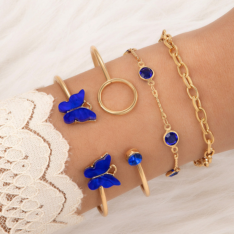 Bracelet à quatre couches creux clouté de diamants papillon bleu