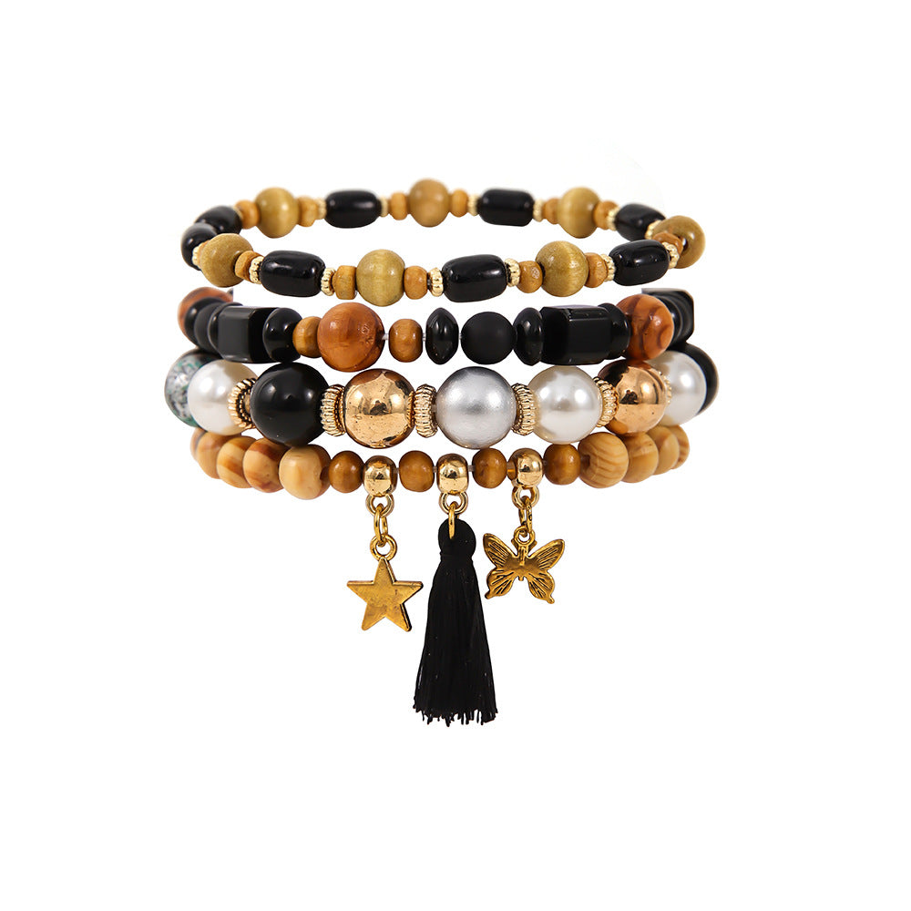 Costume de bracelet ethnique en perles de bois et pompon