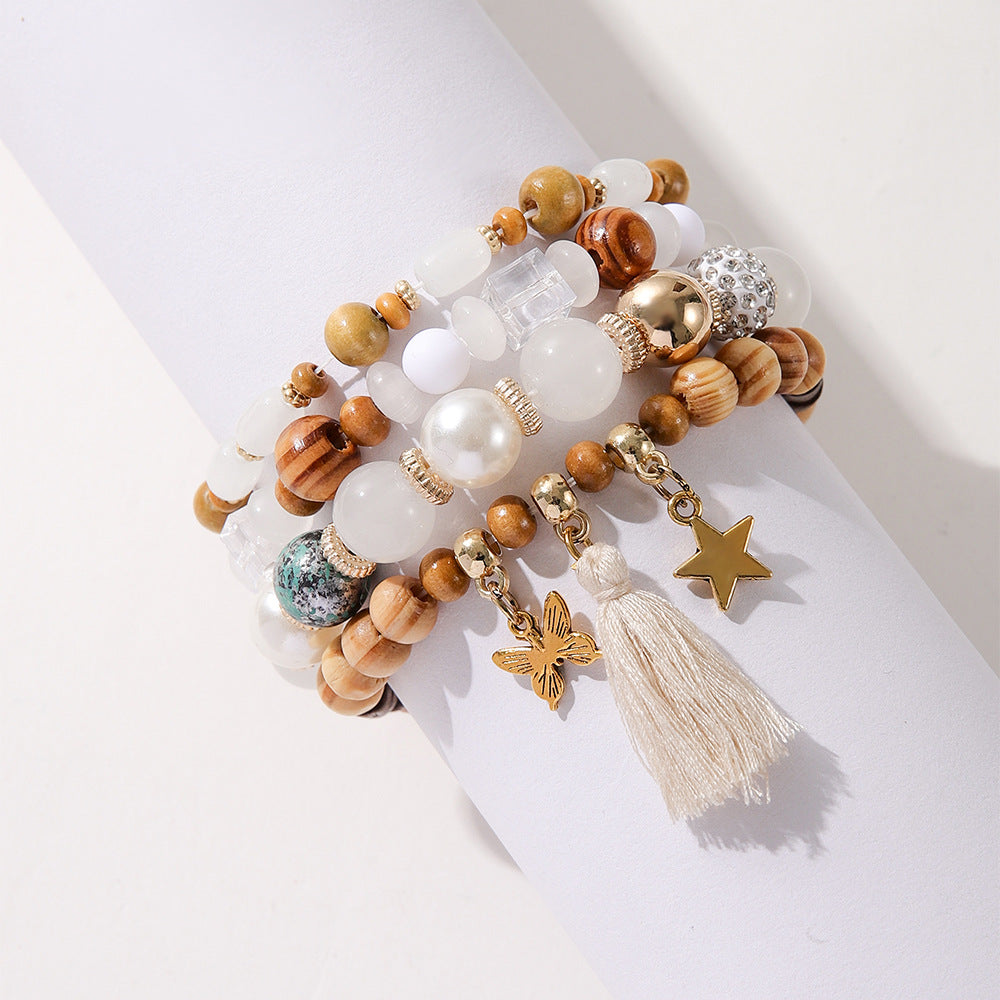 Costume de bracelet ethnique en perles de bois et pompon