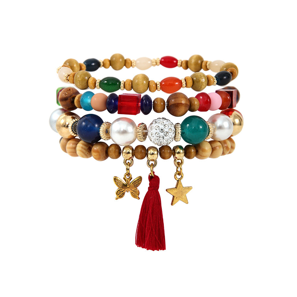 Costume de bracelet ethnique en perles de bois et pompon