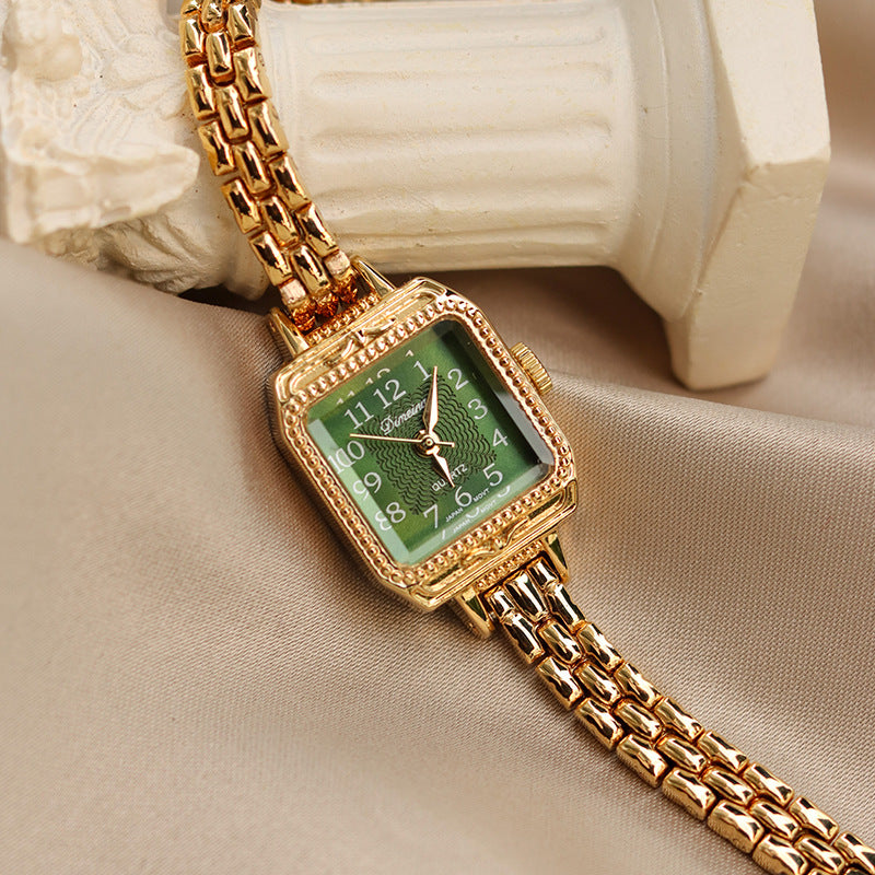 Reloj cuadrado de antigüedad media con tiras de cobre para mujer