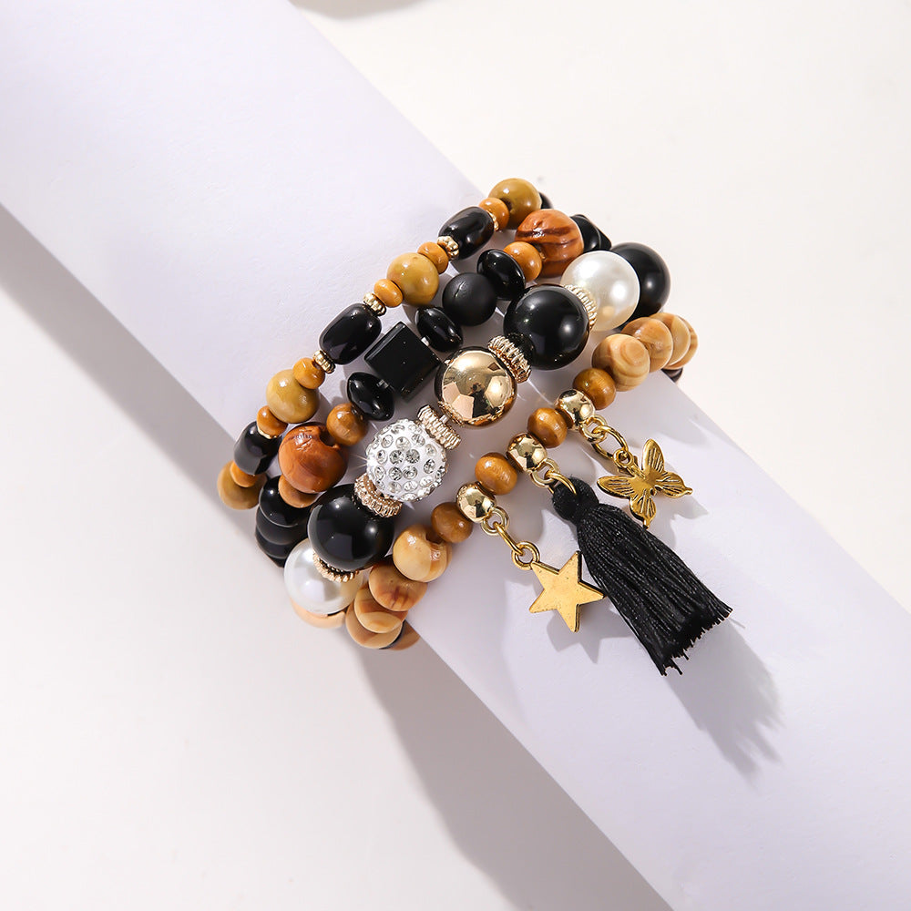 Costume de bracelet ethnique en perles de bois et pompon