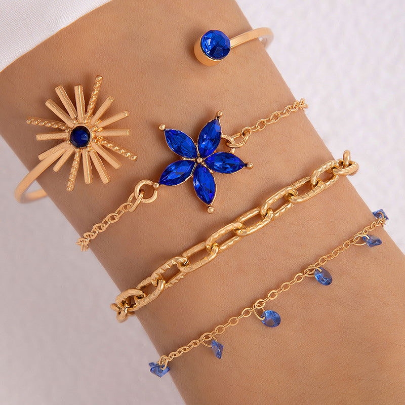 Bracelet à quatre couches creux clouté de diamants papillon bleu