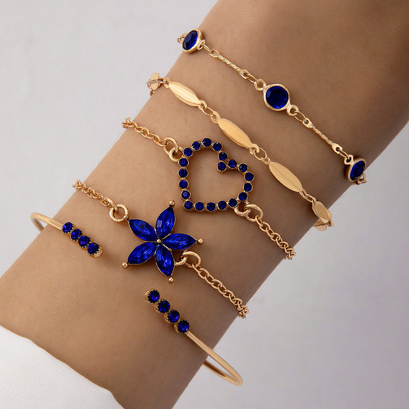 Bracelet à quatre couches creux clouté de diamants papillon bleu