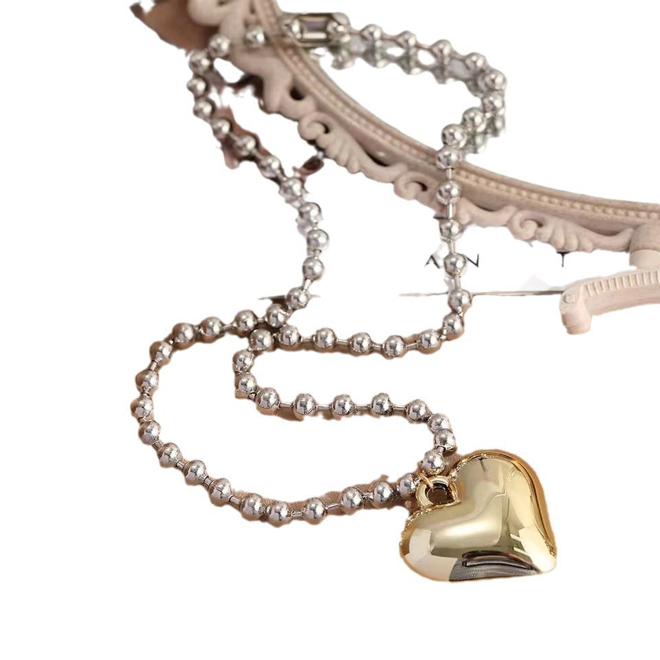 Collier à pendentif d'amour assorti à la mode