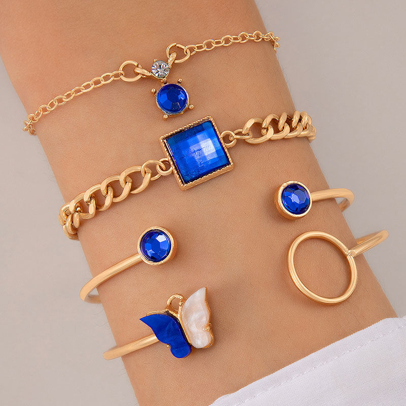 Bracelet à quatre couches creux clouté de diamants papillon bleu