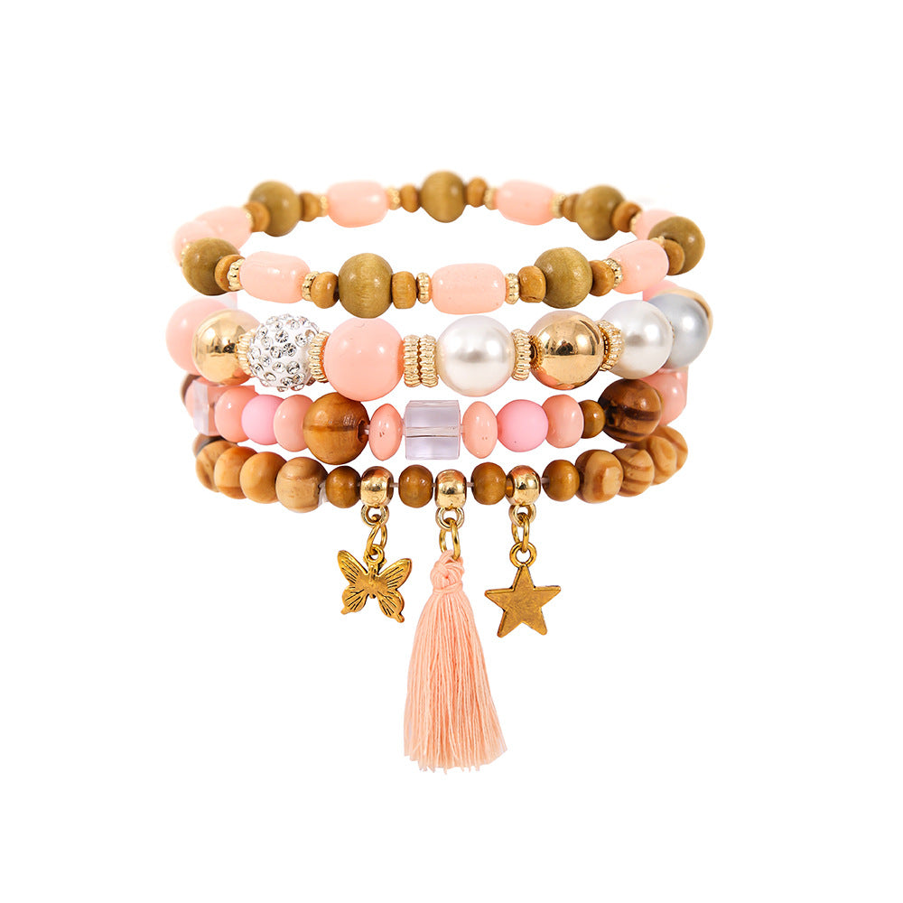 Costume de bracelet ethnique en perles de bois et pompon