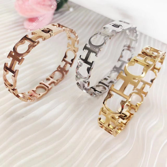 Bracelet à lettres en acier inoxydable, niche, ne se décolore pas, en forme d'œuf, fermeture à ressort creuse