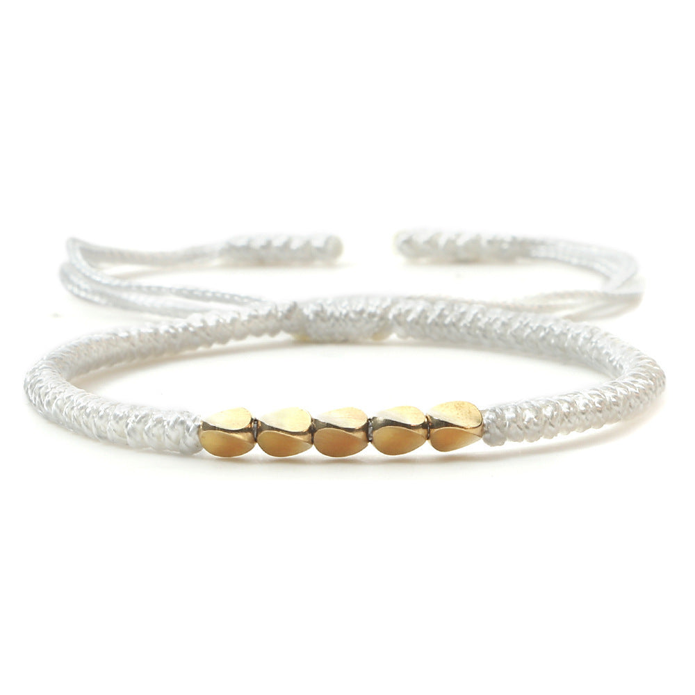 Bracelet perlé en perles de cuivre de forme irrégulière tissé à la main
