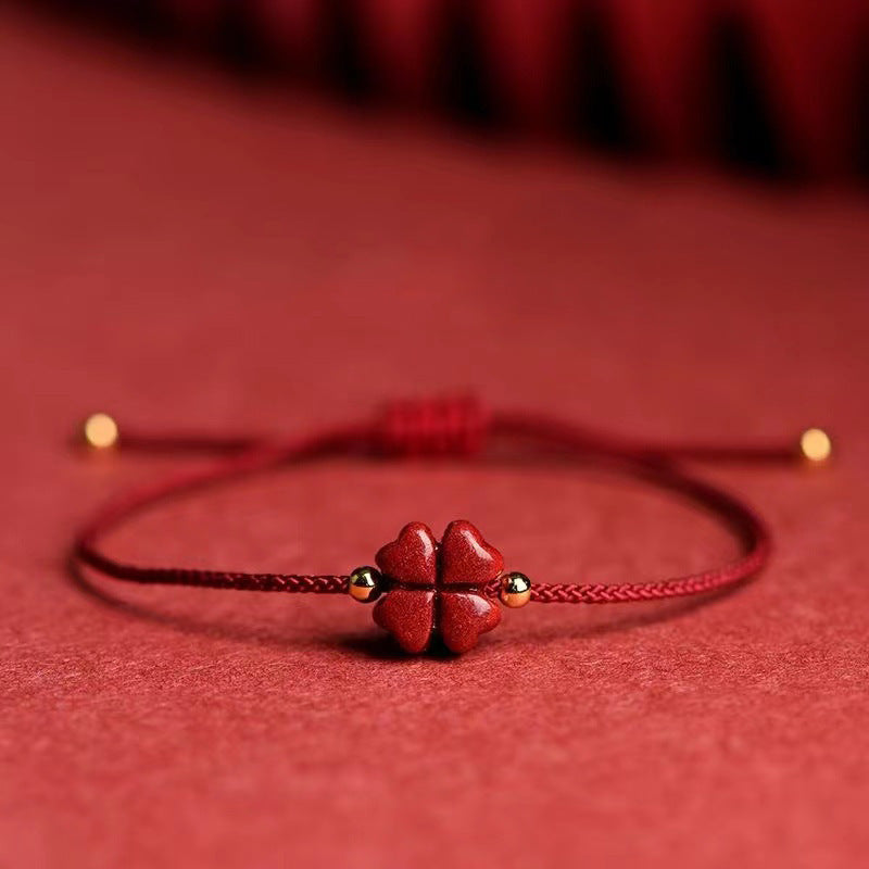 Bracelet corde rouge trèfle cinabre