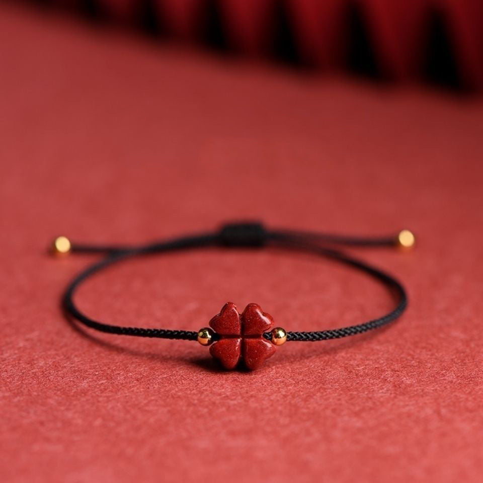 Bracelet corde rouge trèfle cinabre