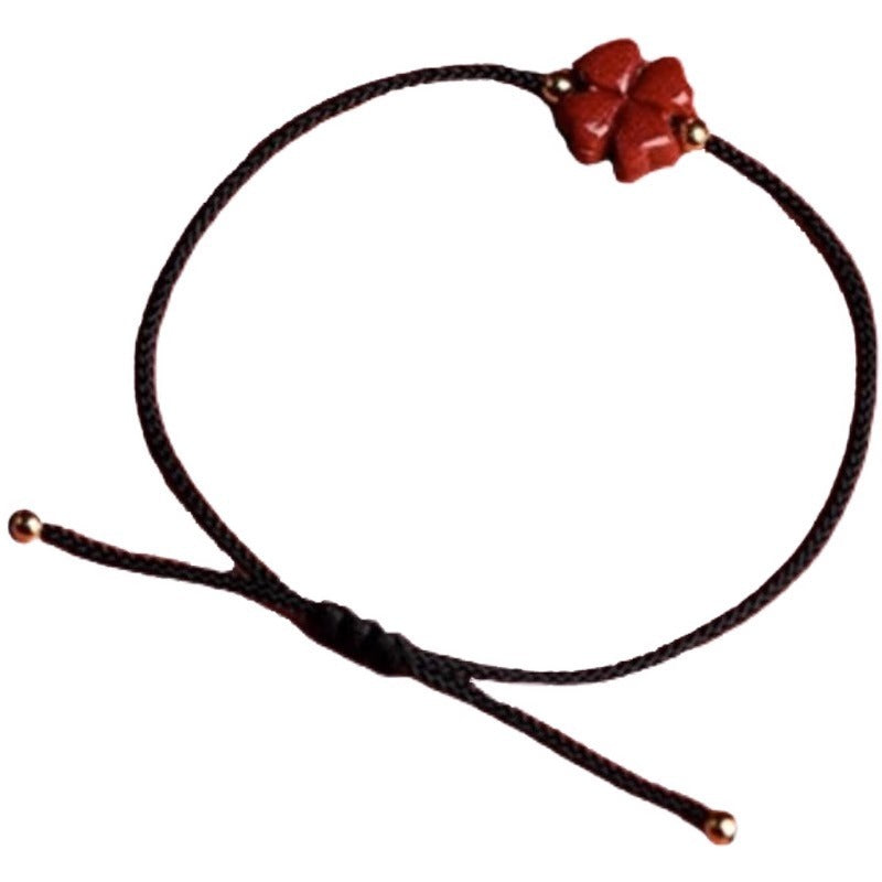 Bracelet corde rouge trèfle cinabre