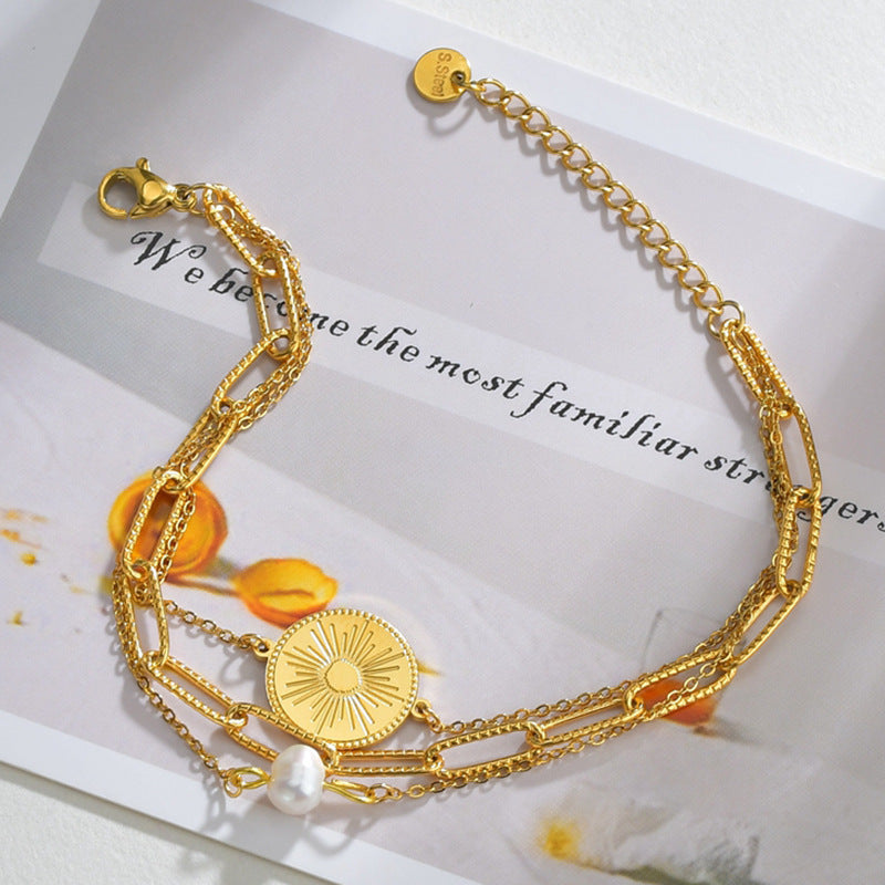 Bracelet en titane et acier, or 18 carats, trois couches, motif foncé, perles rondes, ornement