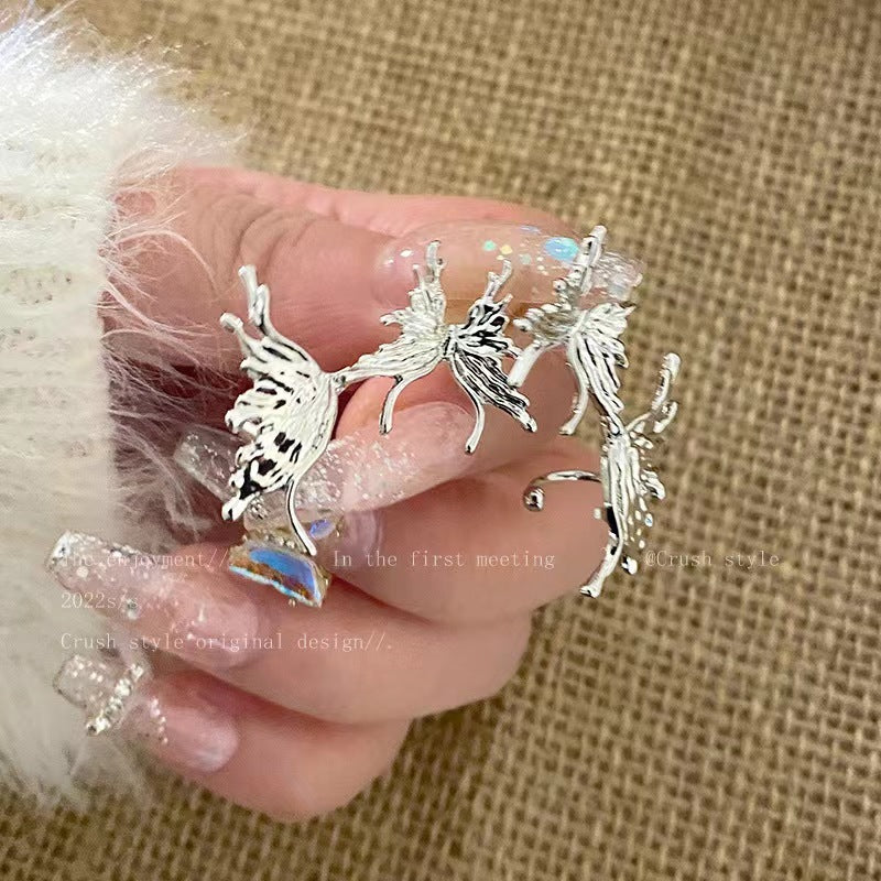 Boucles d'oreilles à tige intégrées en forme de papillon liquide argenté, Clip d'oreille