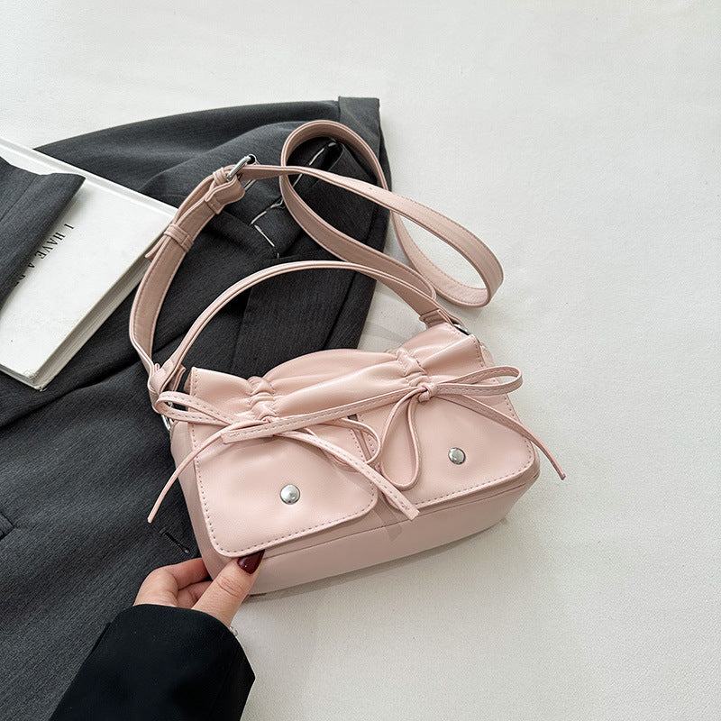 Sac à bandoulière assorti en cuir souple de style occidental
