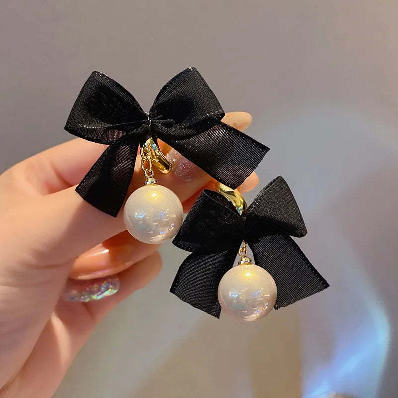 Boucles d'oreilles françaises élégantes avec nœud noir