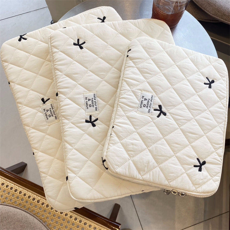 Lindo bolso para guardar cuadernos con lazo bordado y rombos