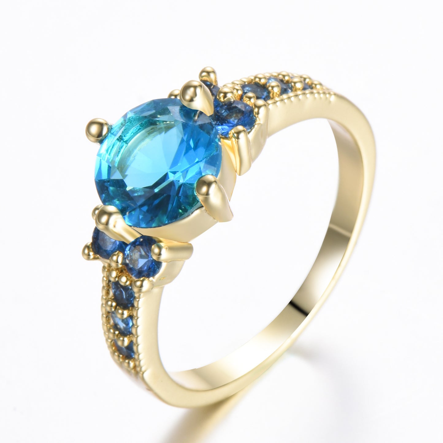 Bague ronde à quatre griffes en zircon et strass