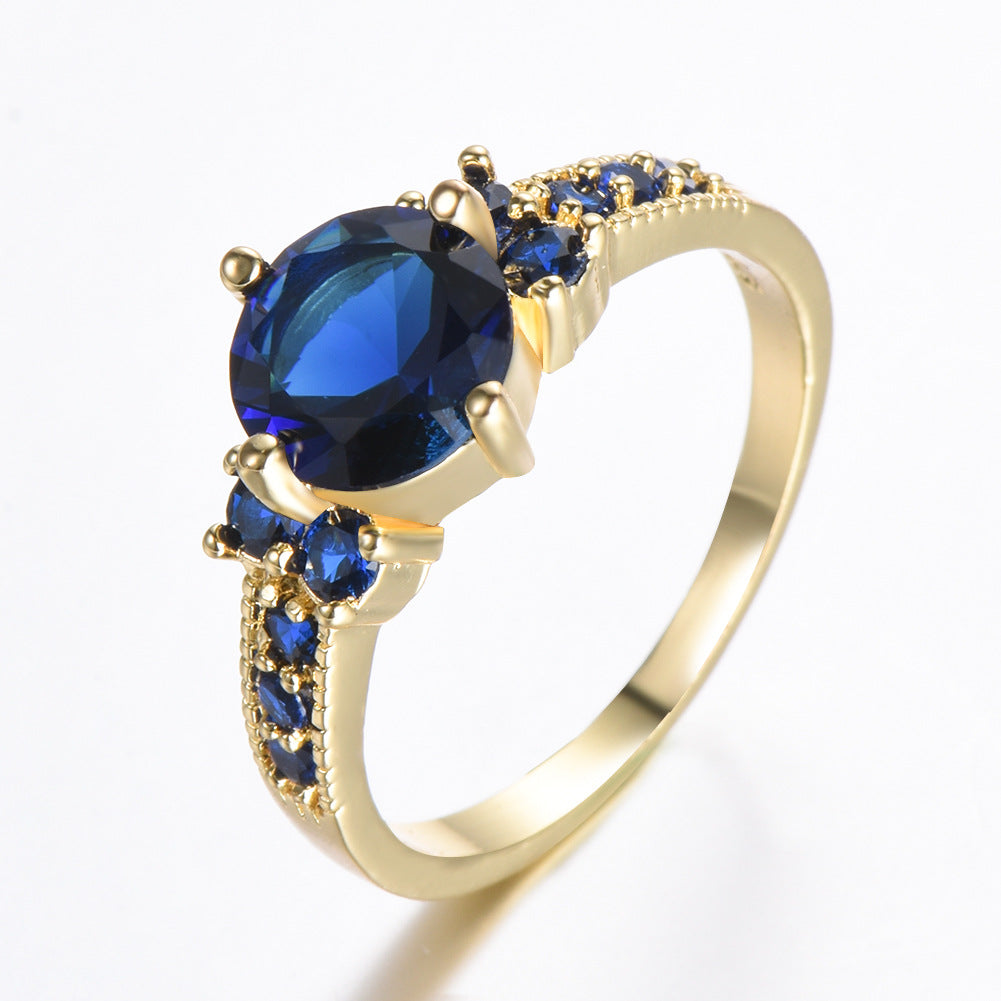 Bague ronde à quatre griffes en zircon et strass