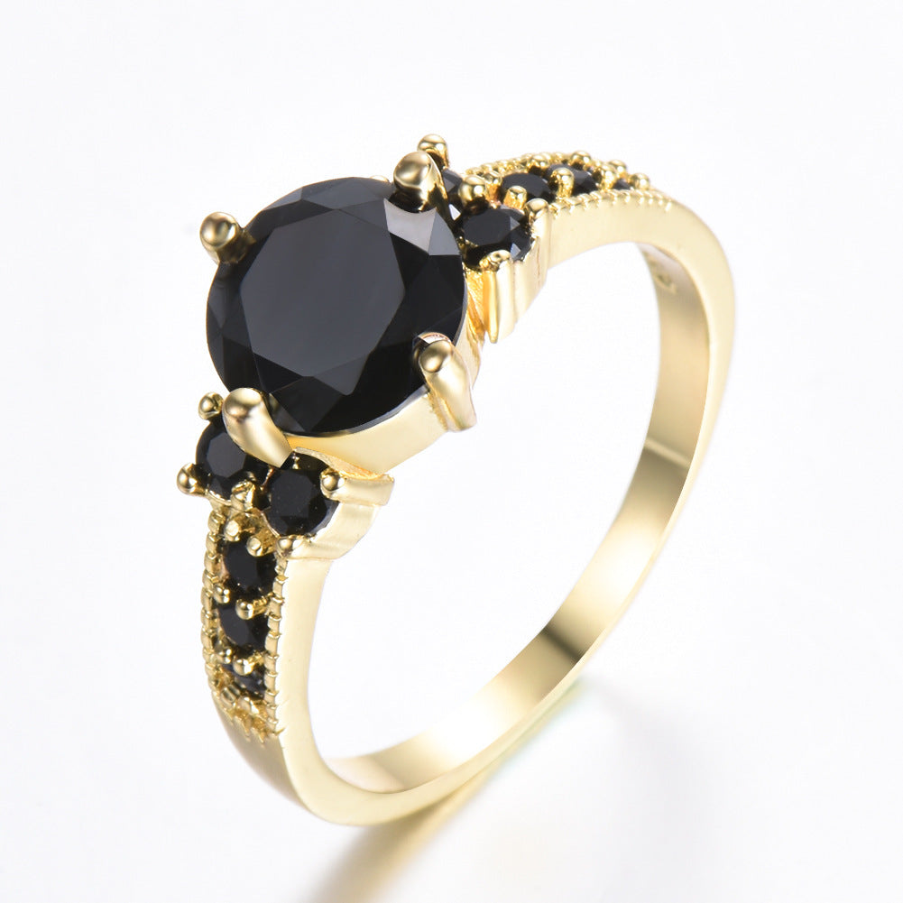 Bague ronde à quatre griffes en zircon et strass