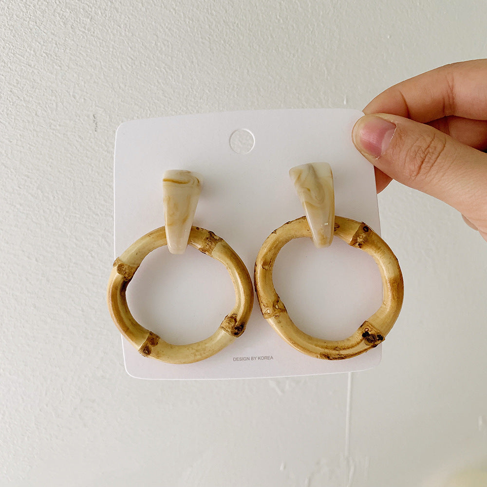 Boucles d'oreilles rondes en rotin à géométrie exagérée vintage de Corée du Sud