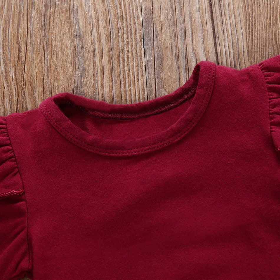 Tailleur deux pièces jupe porte-jarretelles imprimée