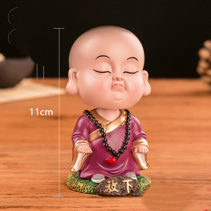 Car car decoration Zen Miao shook her head