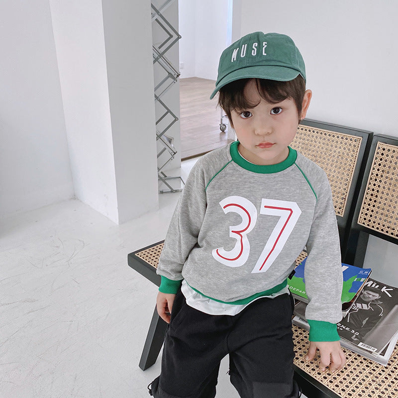 Ropa para niños al por mayor otoño nuevos niños suéter de cuello redondo niña bebé 37 letras color a juego suéter de niños coreanos
